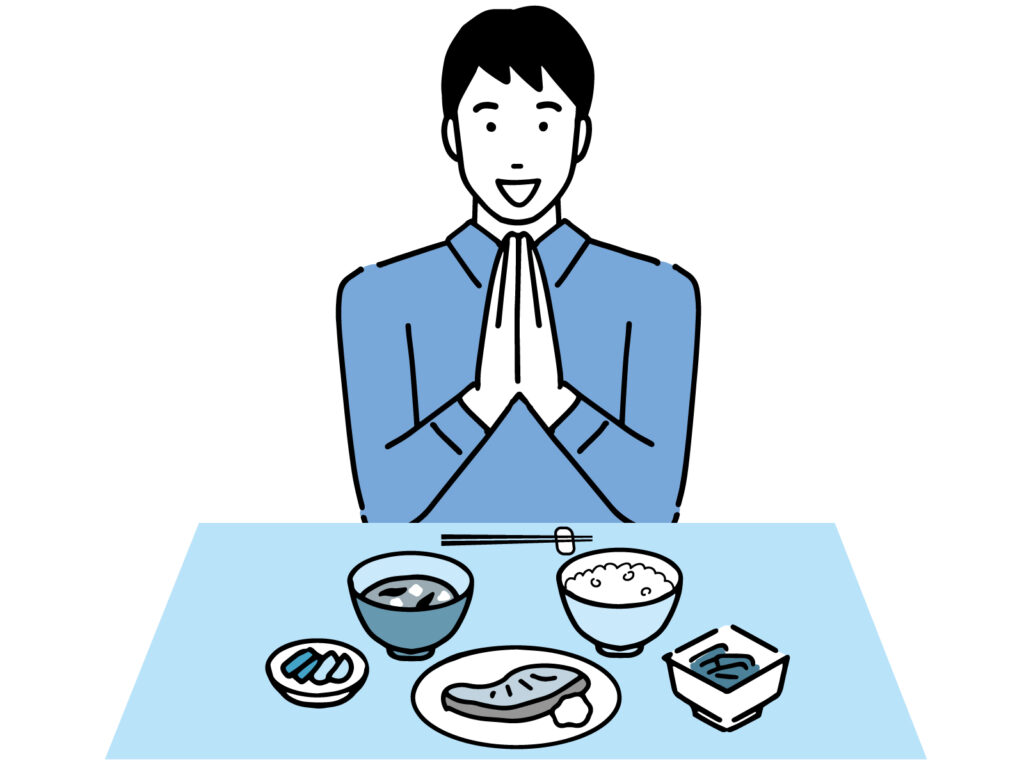 男性が食卓に一汁三菜バランスよく並べ手を合わせていただきますをしている様子のイラスト